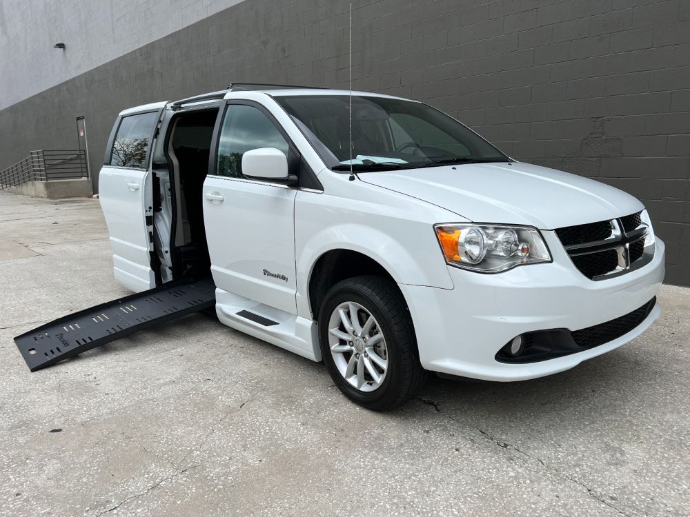 A Manuel’s Express accessible van with its side-entry ramp — smooth boarding for wheelchair riders